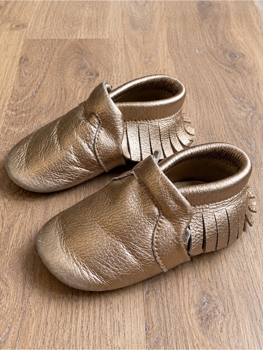 Baby Metallic Bronze Moccasin Slip-Ons with Fringe